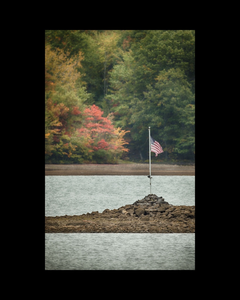 The Flag at Glass Lake. Nikon Df camera, MC MTO-1100 telephoto lens. Photo by Chuck Miller.