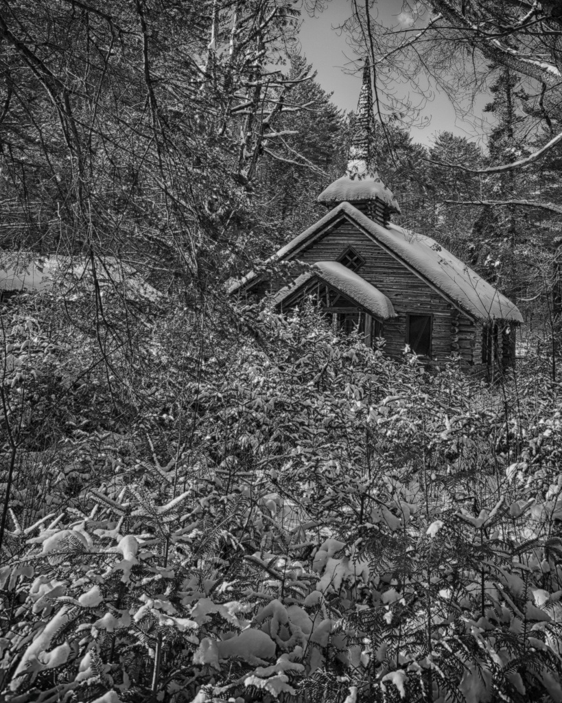 Chapel in the snow. Nikon Df camera, Vivitar 19mm f3.8 lens, flipped to black and white. Photo by Chuck Miller.